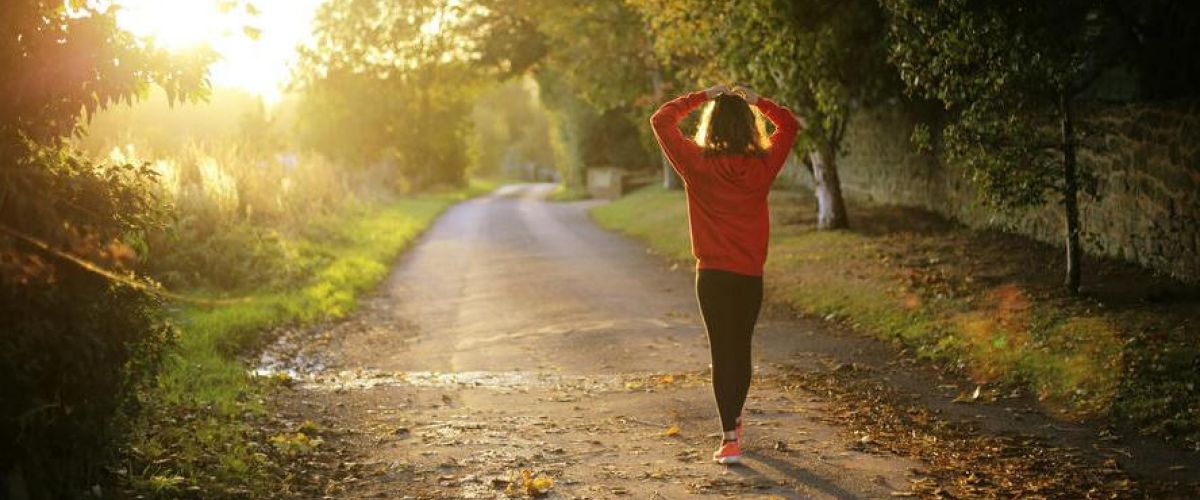 woman walking in peaceful forrest in tennessee