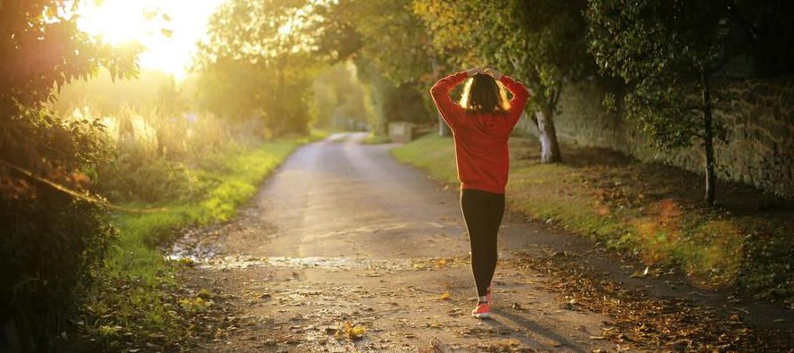 woman walking in peaceful forrest in tennessee