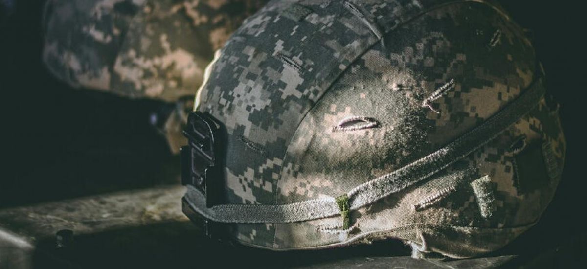 an army helmet that represents tricare insurance for military personell