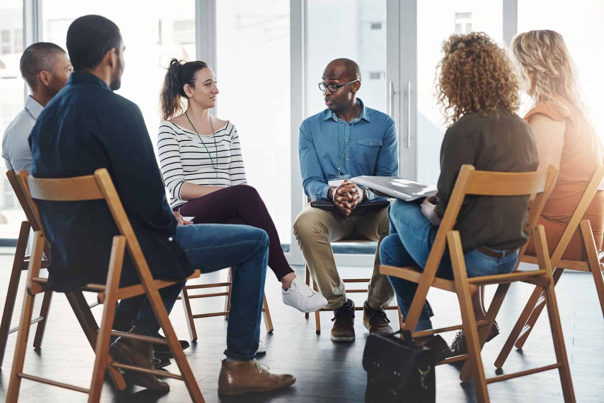 Participants sharing during group therapy in Nashville, TN